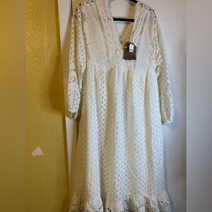 New with Tag Anthropologie long cut outs lining dress